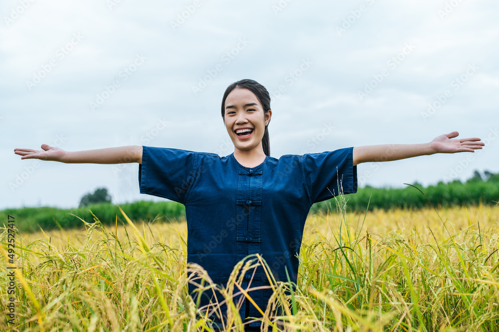 Portrait young female farmer in rice field Portrait young female farmer in rice field