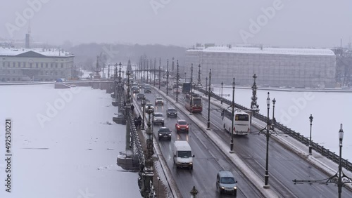 City traffic on the troitsky bridge winter time Saint Petersburg Russia  photo