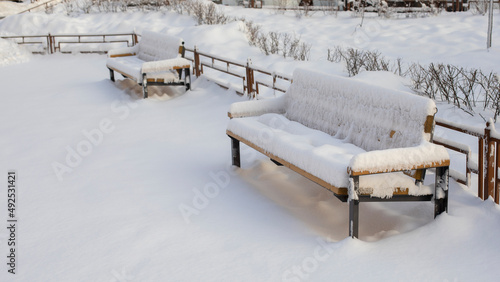 Wallpaper Mural Snow-covered bench sunk large amount of precipitation in winter, snowfall in the city Torontodigital.ca
