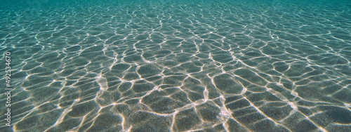 Stampa su tela Sand underwater with natural light, sandy ocean floor, eastern Atlantic ocean