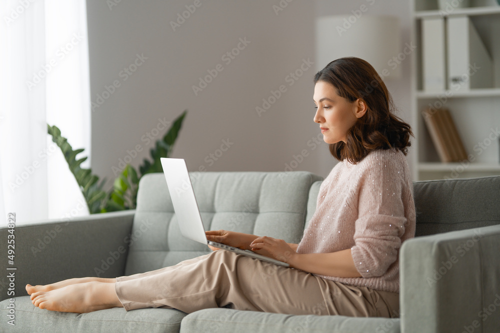 Fototapeta premium woman using laptop