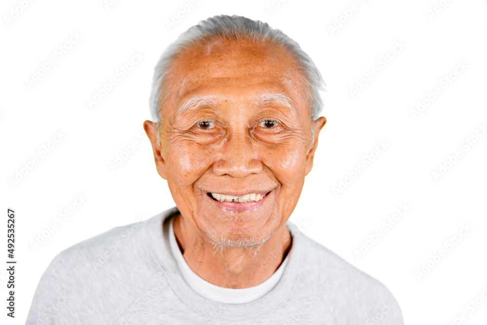 Close up of old man face smiling at the camera Close up of old man face smiling at the camera