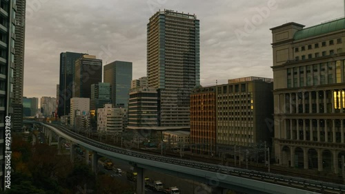 Wallpaper Mural Time lapse night to day to night transition of busy railway in Tokyo, Japan Torontodigital.ca
