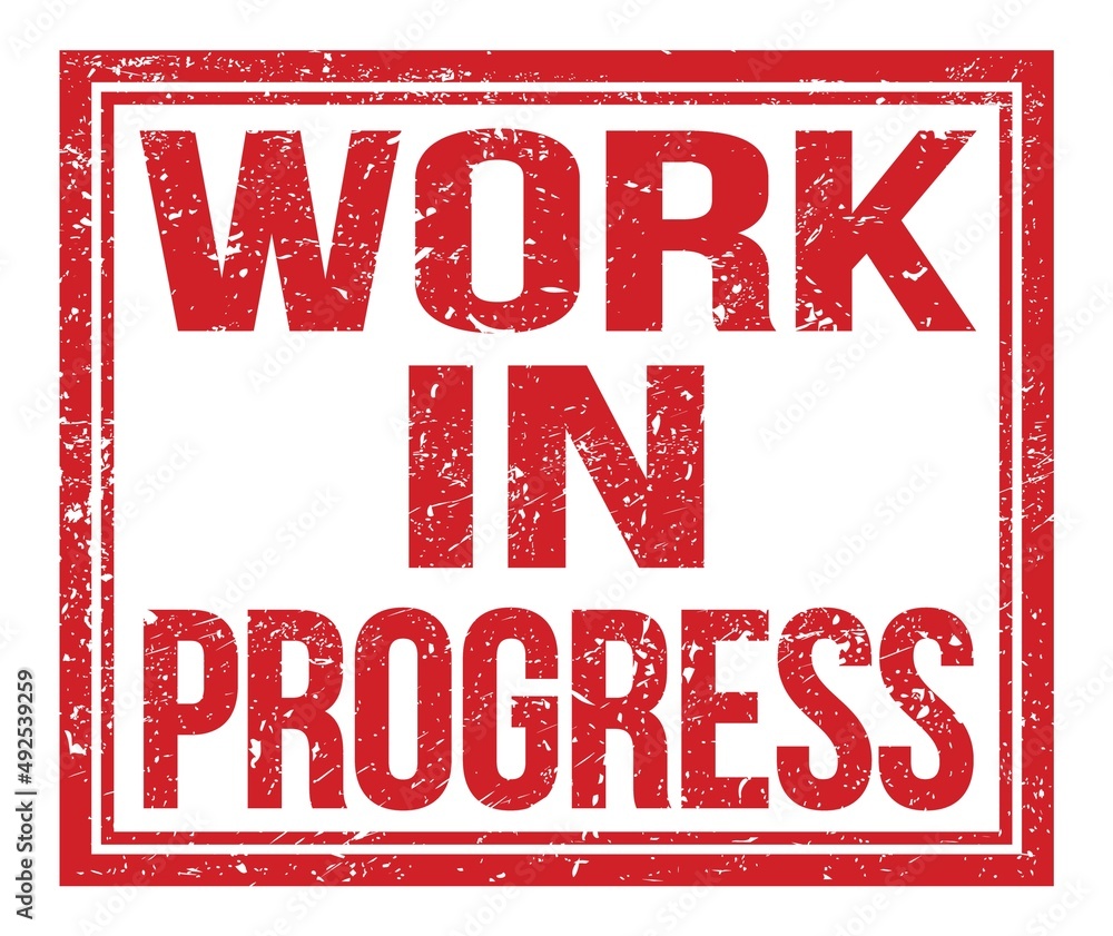 Fotografie WORK IN PROGRESS, text on red grungy stamp sign