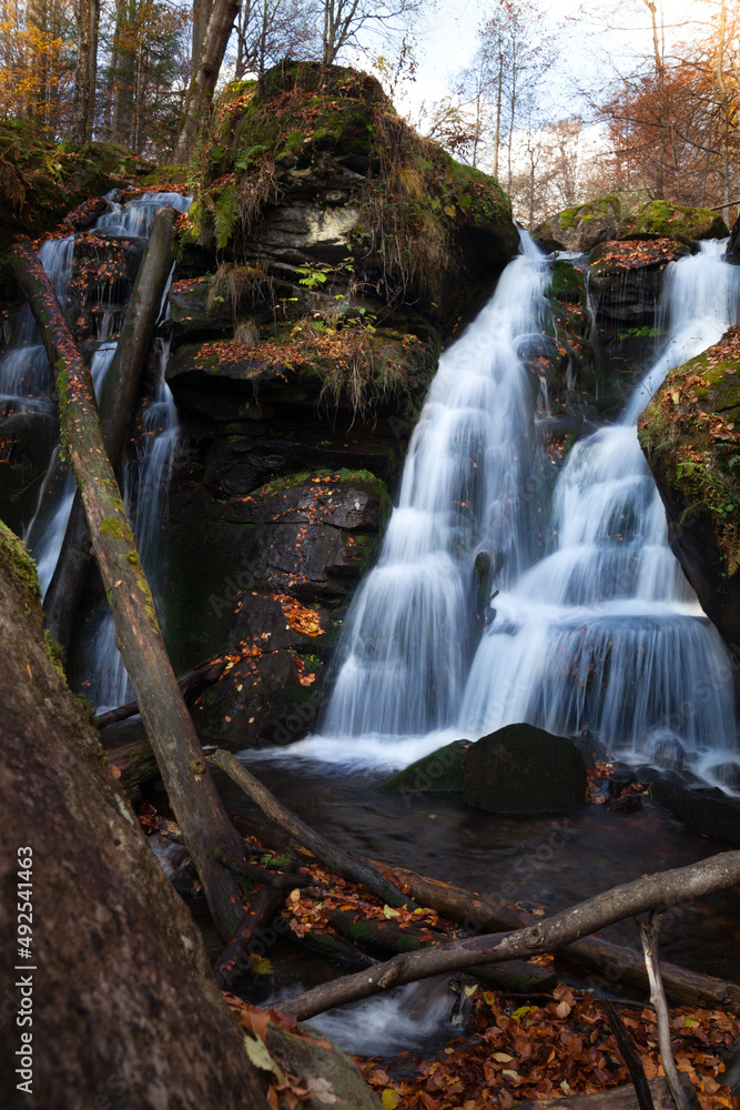 Fototapeta premium View of the waterfall beautiful waterfall, mountain river, Transcarpathia, Ukraine.