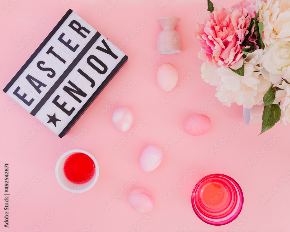 Obraz premium Easter eggs pastel colors on pink background