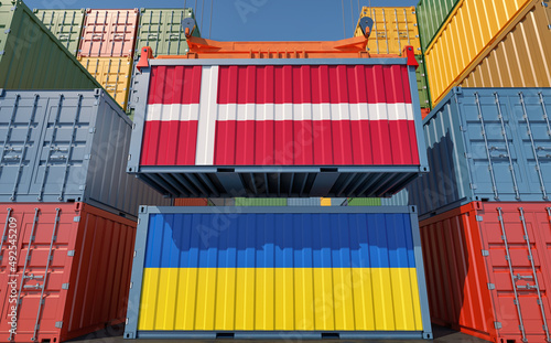 Cargo containers with Denmark and Ukraine national flags. 3D Rendering 