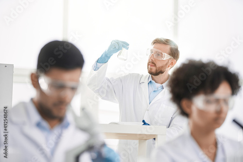 image a group of scientists working in a laboratory.