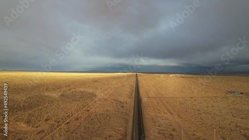 Aerial of grasslands in Northern Arizona with long road into infinity photo