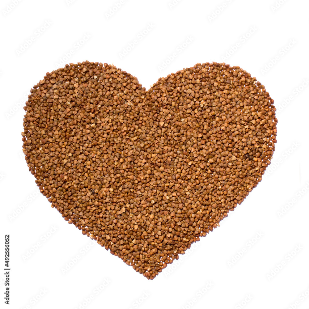 raw buckwheat porridge in the shape of a heart
