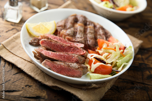 Grilled beef steak with vegetable salad