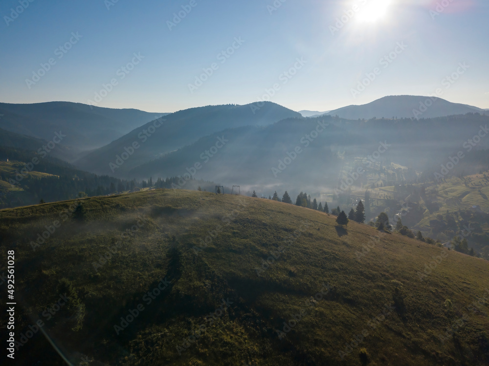 Obraz premium Ukrainian Carpathians mountains on a summer morning. Aerial drone view.