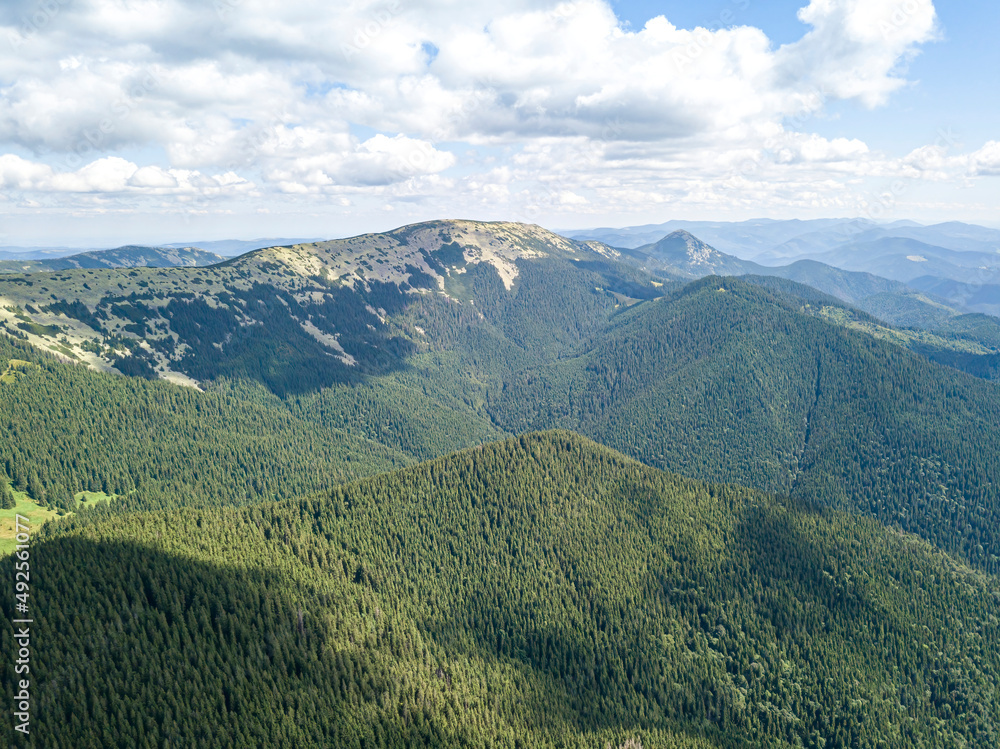 Obraz premium High mountains of the Ukrainian Carpathians in sunny weather. Aerial drone view.