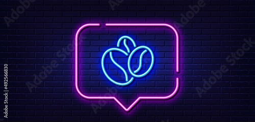Neon light speech bubble. Coffee beans line icon. Hot cappuccino seed sign. Roasted seeds symbol. Neon light background. Coffee beans glow line. Brick wall banner. Vector
