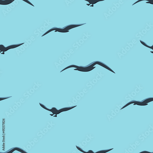 Seagulls seamless pattern. Dark gulls flying on light blue background. Marine vector endless pattern