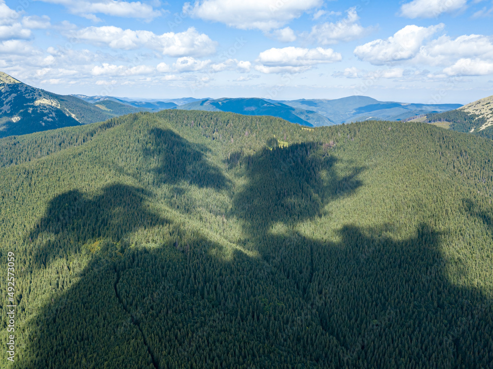 Fototapeta premium High mountains of the Ukrainian Carpathians in sunny weather. Aerial drone view.
