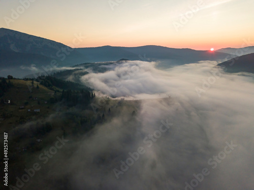 Morning fog in the Ukrainian Carpathians. Aerial drone view.