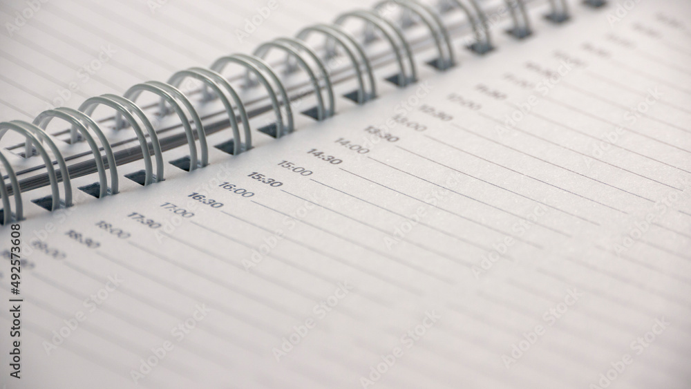 Cuaderno de espiral con páginas con las horas del día impresas Cuaderno de espiral con páginas con las horas del día impresas