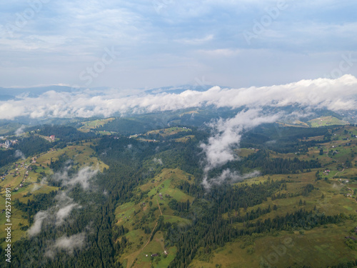 High flight in the mountains of the Ukrainian Carpathians. Aerial drone view. © Sergey