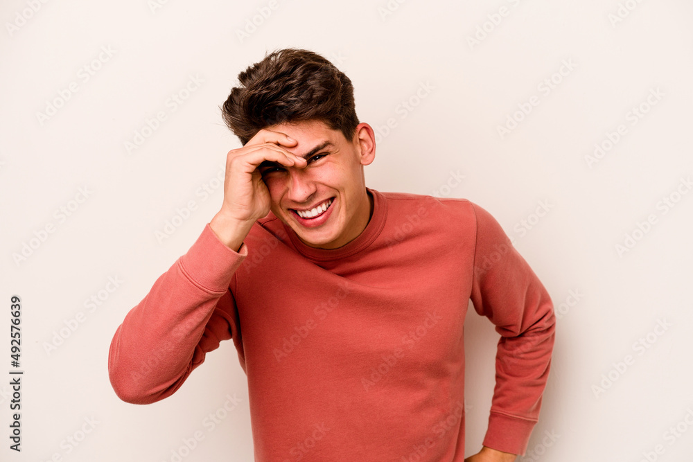 Young caucasian man isolated on white background joyful laughing a lot. Happiness concept. Young caucasian man isolated on white background joyful laughing a lot. Happiness concept.