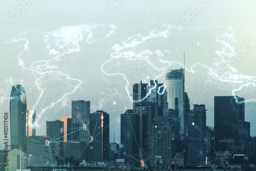 Double exposure of abstract digital world map on Los Angeles city skyscrapers background, research and strategy concept