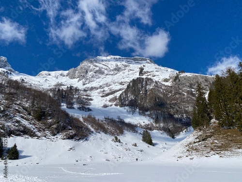 Snow-capped alpine peak Stoss (or Stooss, 2112 m) in Alpstein mountain range and in Appenzell Alps massif, Unterwasser - Canton of St. Gallen, Switzerland (Schweiz) photo