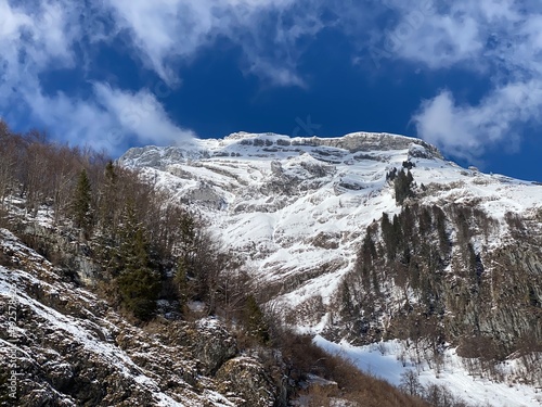 Snow-capped alpine peak Stoss (or Stooss, 2112 m) in Alpstein mountain range and in Appenzell Alps massif, Unterwasser - Canton of St. Gallen, Switzerland (Schweiz) photo