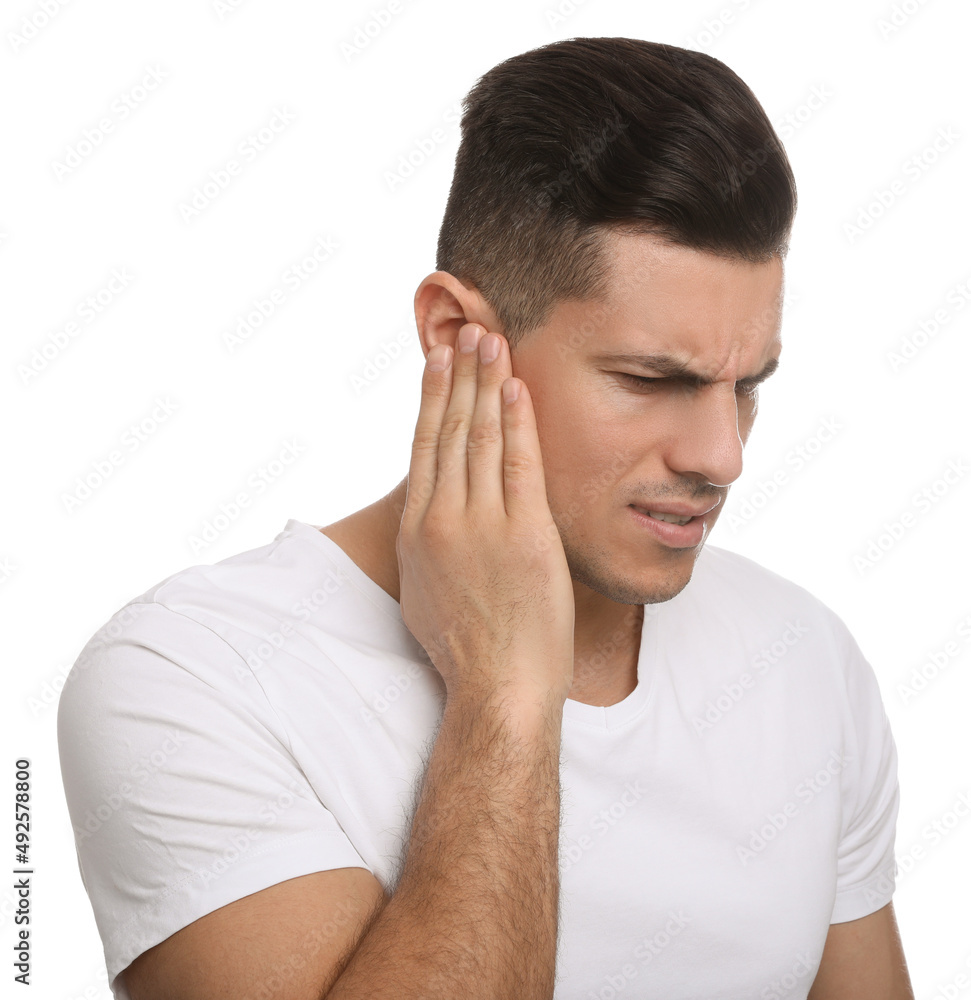 Man suffering from ear pain on white background Man suffering from ear pain on white background
