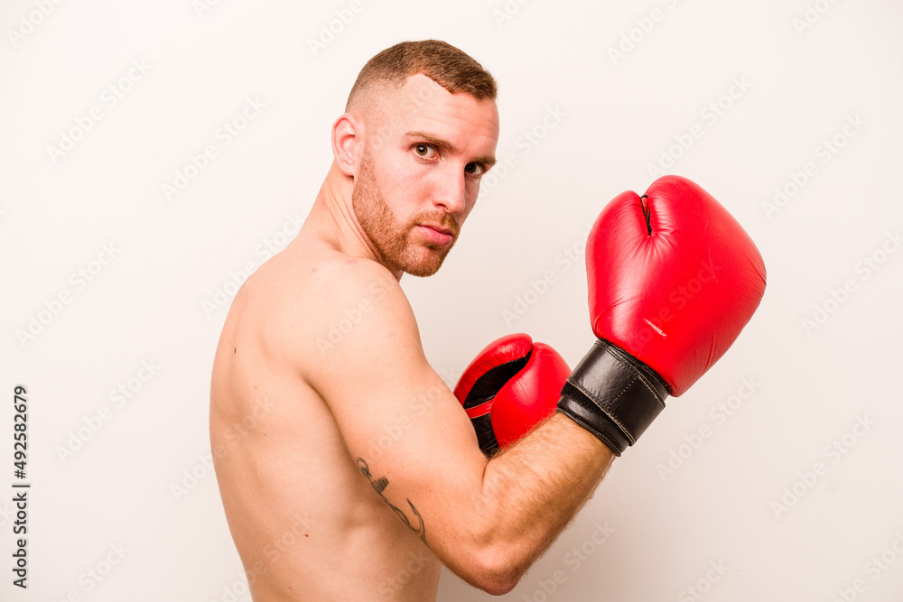 Young caucasian man doing boxing isolated on white background Young caucasian man doing boxing isolated on white background