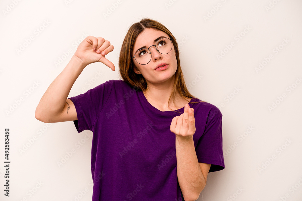 Young caucasian woman isolated on white background showing that she has no money. Young caucasian woman isolated on white background showing that she has no money.