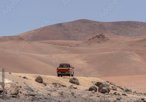 Driving through impossibly difficult roads in the Atacama desert, Chile, near the border with Bolivia and Argentina photo