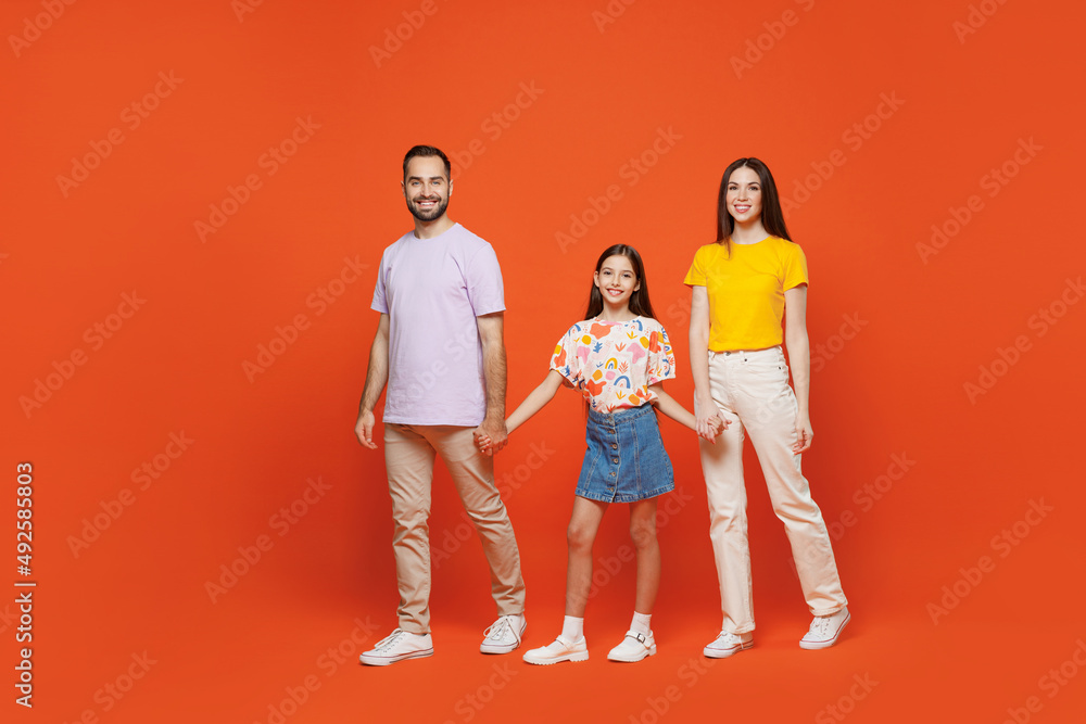 Ταπετσαρία Full body young smiling fun happy parents mom dad with child kid daughter teen girl wear basic t-shirts walking go hold hands isolated on yellow background
