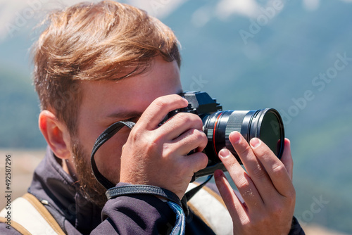 Quadro em tela Photographer taking pictures in nature