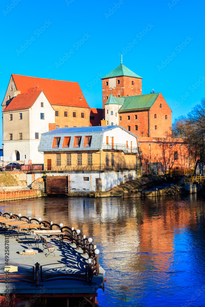 Castle of the Pomeranian Dukes or Darlowo castle on a bank of the Wieprza river in Darlowo, Poland