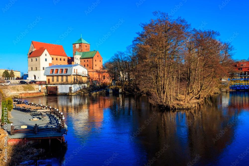 Castle of the Pomeranian Dukes or Darlowo castle on a bank of the Wieprza river in Darlowo, Poland