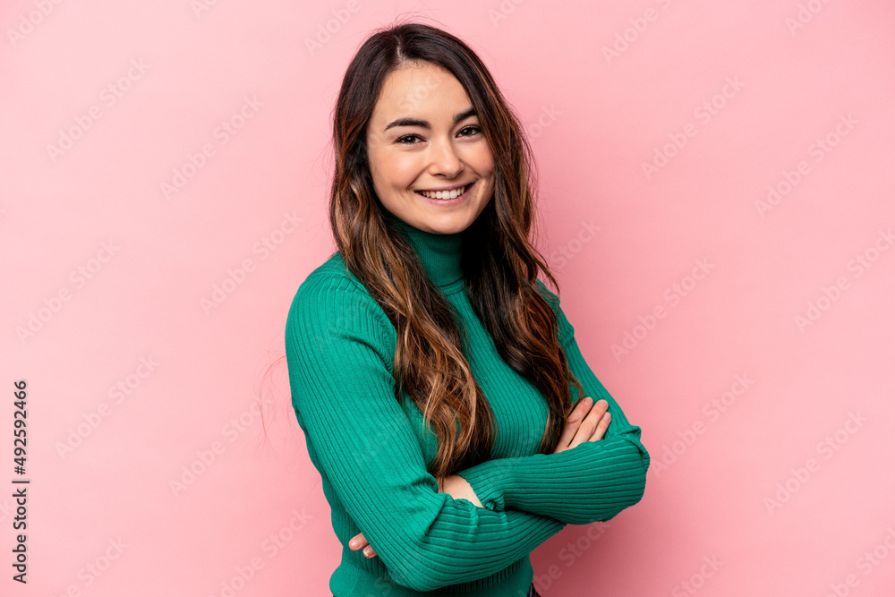Obraz premium Young caucasian woman isolated on pink background happy, smiling and cheerful.
