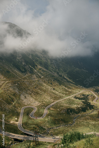 landscape of mountain area with winding road serpentine transfagaras in romania carpathians © dimik_777