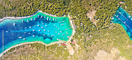 Fototapeta Naklejka Na Ścianę i Meble -  Aerial view of Palmizana, sailing cove and turquoise beach on Pakleni Otoci islands