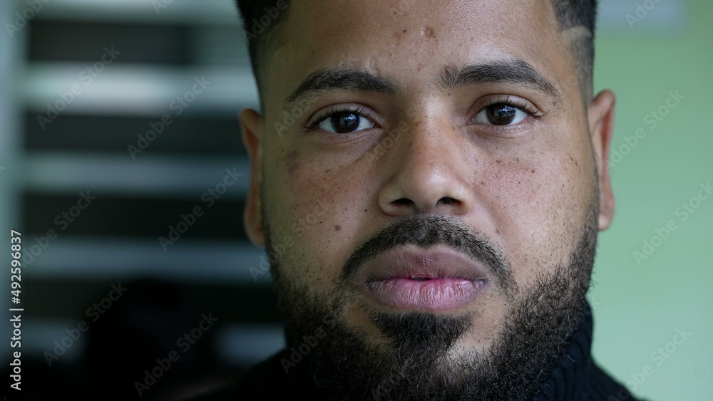 A casual hispanic black man portrait face a Brazilian person serious emotion A casual hispanic black man portrait face a Brazilian person serious emotion