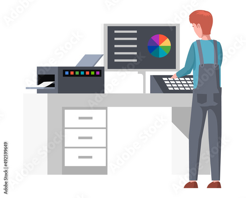 Man works with device for choosing color of printing ink. Printing equipment, commercial printer, copier, scanner. Employee controls printing process in polygraphy, typography with computer