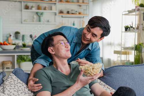 Asian gay couple happy and having romantic moment together at home