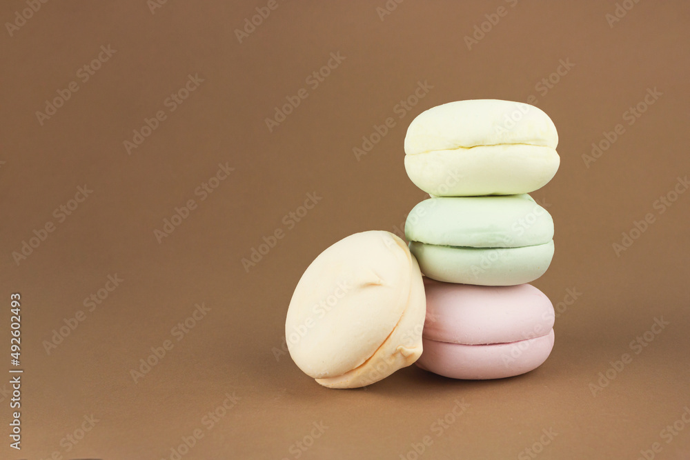 Delicious Sweet Colorful marshmallows looks like Macarons, French meringue cookies macaron. Brignt macarons for sweet break Delicious Sweet Colorful marshmallows looks like Macarons, French meringue cookies macaron. Brignt macarons for sweet break