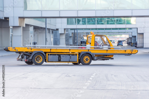 Cargo equipment car loader for luggage in the airport hub.