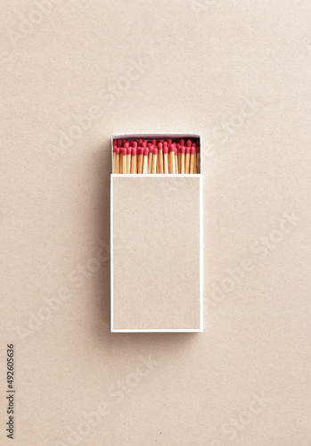 big size of matchbox on light brown paper background with copy space for text or image , matchbox background