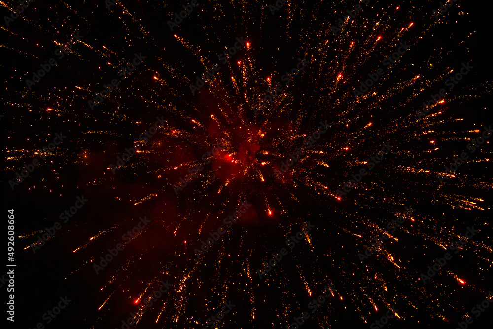 Firework. Night sky. Red, orange, yellow lights. Firework. Night sky. Red, orange, yellow lights.