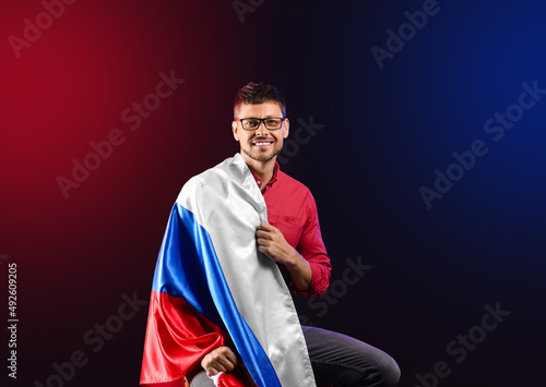 Handsome man with flag of R...