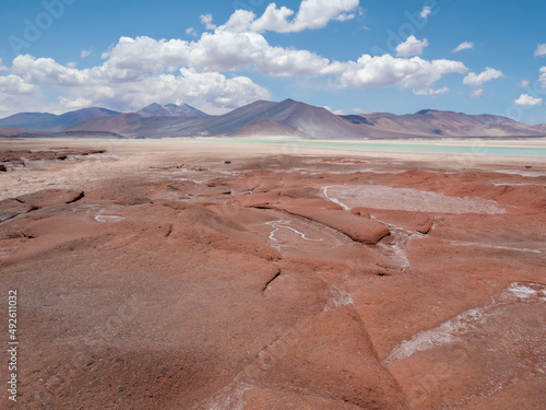 Piedras Rojas (Red Stones) a volcanic salt lagoon (4200 mts above sea level) surrounded by unqiue reddish rock formations, Atacama desert, Chile photo