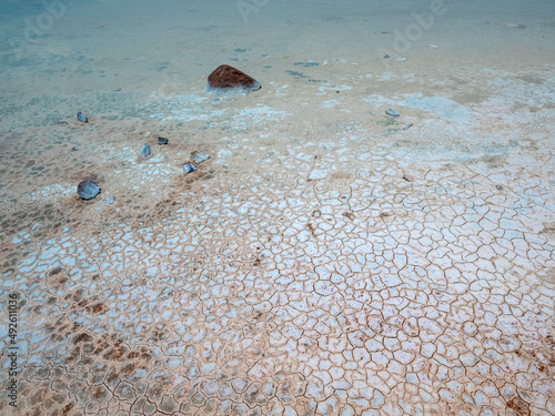 Piedras Rojas (Red Stones) a volcanic salt lagoon (4200 mts above sea level) surrounded by unqiue reddish rock formations, Atacama desert, Chile photo