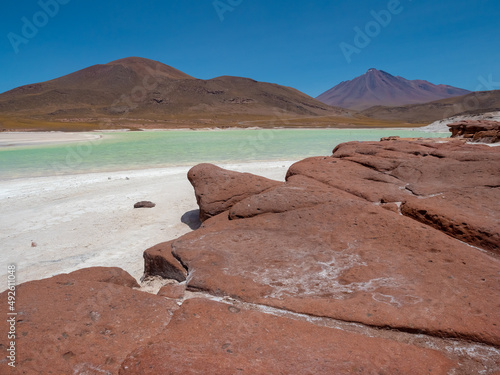 Piedras Rojas (Red Stones) a volcanic salt lagoon (4200 mts above sea level) surrounded by unqiue reddish rock formations, Atacama desert, Chile photo