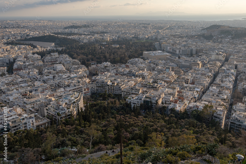 Obraz premium Athens Greek capital seen from above. Bird's eye view from Acropolis over the city with white houses, towers.